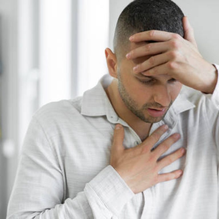 Man suffering from breathing problem